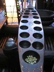 Sungka board with carvings