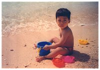 Adi playing with sand